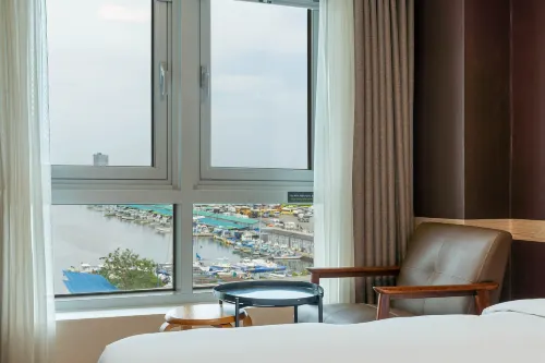 Chungchoho Best Hotel Номера Photos