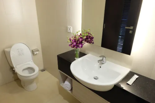 World Hotel Jakarta - Bandengan Zimmer Photos