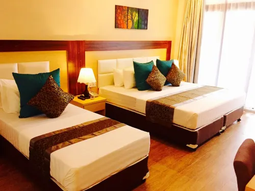 Triton Beach Hotel & Spa Chambres Photos
