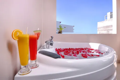 Triton Beach Hotel & Spa Chambres Photos