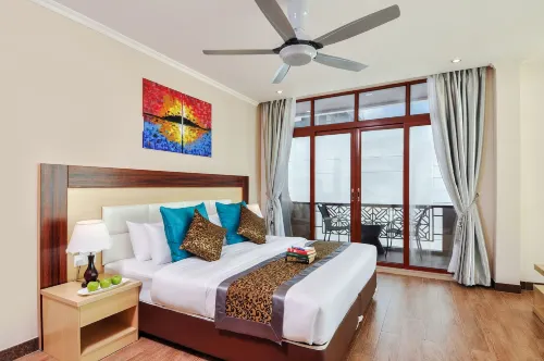 Triton Beach Hotel & Spa Chambres Photos
