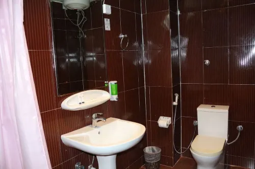 Grand Sina Hotel Rooms Photos