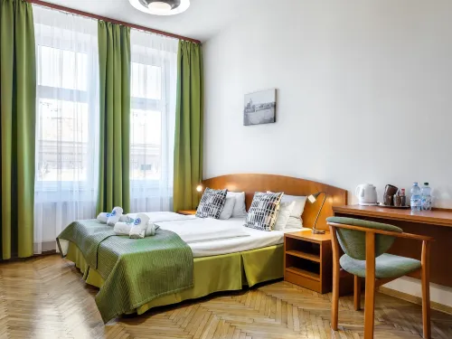 Kosmopolita Rooms Photos