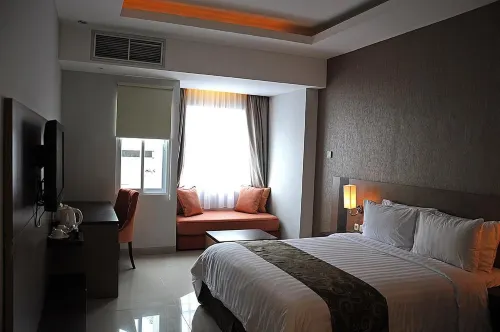 Quest Hotel Kuta Bali  by Aston Photos