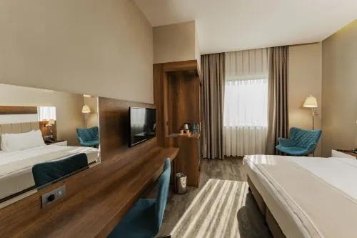 Vespia Hotel Rooms Photos