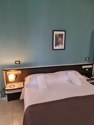 Hotel Amalfitana Zimmer Photos
