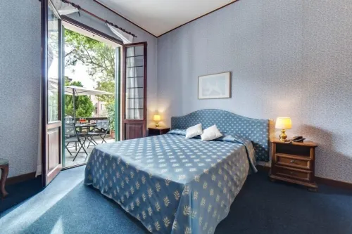 Hotel la Meridiana Habitaciones Photos