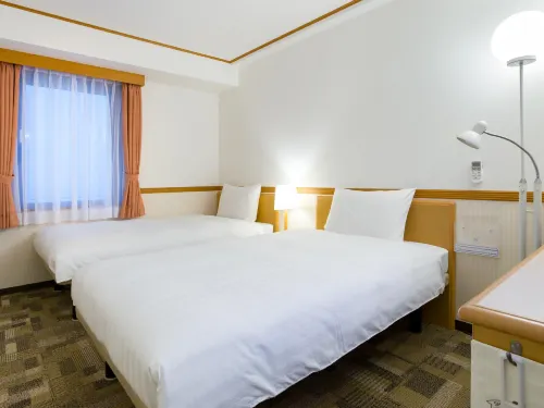 Toyoko Inn Fukuyama-Eki Shinkansen Minami-Guchi Zimmer Photos