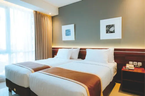 Azana Style Hotel Madura Kamar Photos