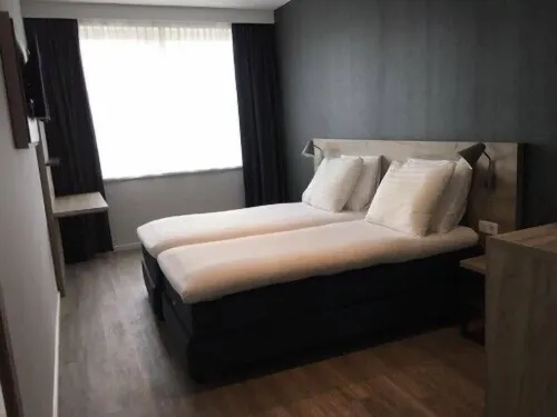 Joy Hotel Rooms Photos