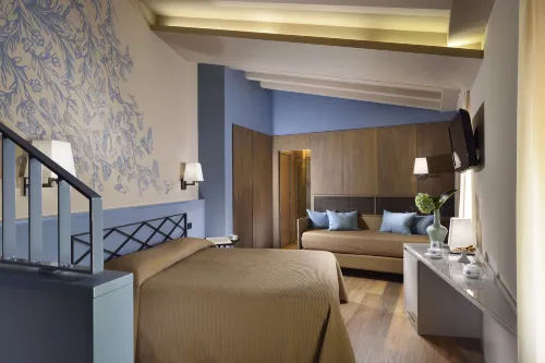 Titano Suites Chambres Photos