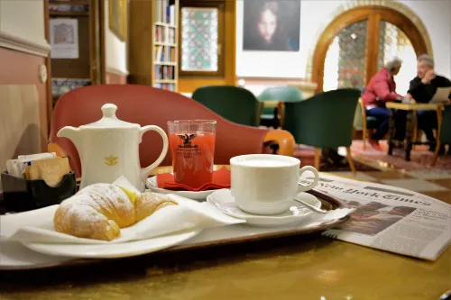 Hotel La Fenice et des Artistes Dining Photos