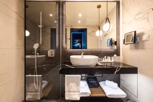 Radisson Blu Hotel at Porsche Design Tower Chambres Photos