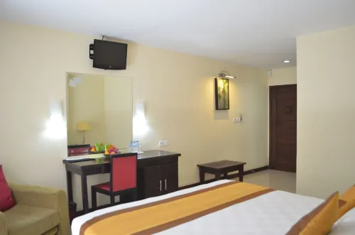 Nirmala Hotel & Convention Centre Kamar Photos