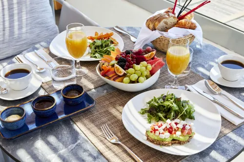 Sea Breeze Santorini Beach Resort, Curio Collection by Hilton Restauration Photos