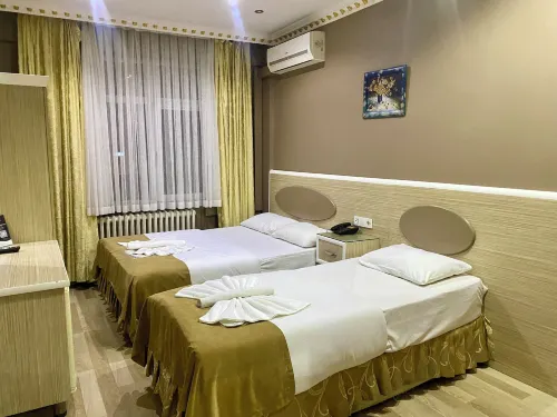 Grand Oral Hotel Rooms Photos