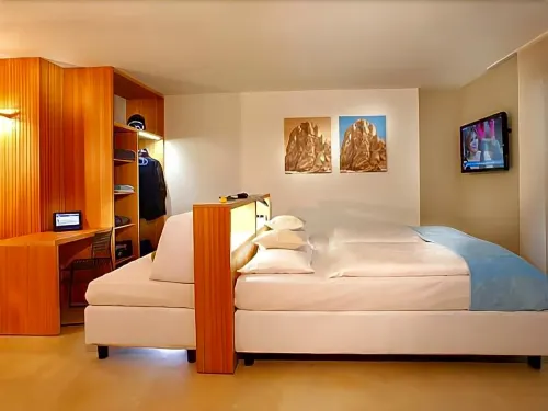 Alpstay - Smart Hotel Saslong Chambres Photos