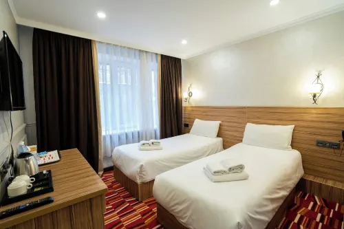 Mildom City Hotel Chambres Photos