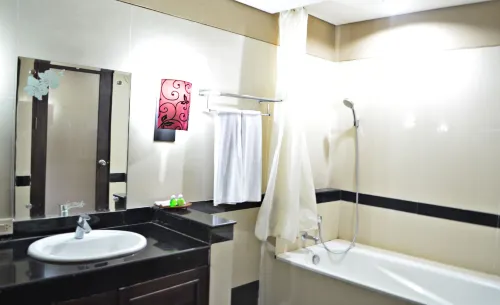Nirmala Hotel & Convention Centre Kamar Photos