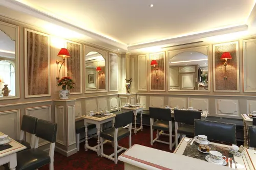 Au Manoir Saint-Germain des Prés. Restauration Photos