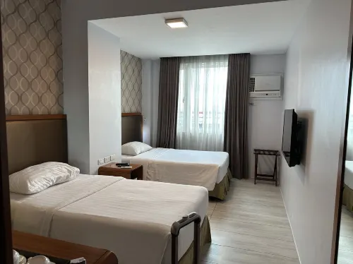 One Central Hotel & Suites Rooms Photos
