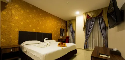 AB Inn Hotel Kamar Photos