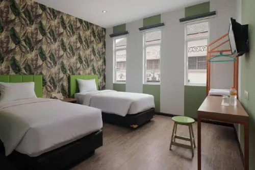 Kama Hotel Kamar Photos