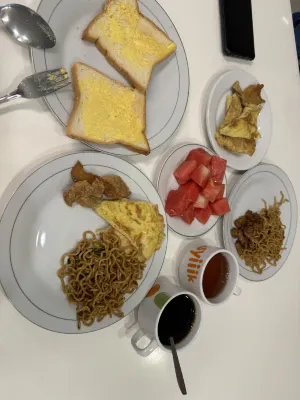 팝 호텔 말리오보로 요그야카르타 식사 Photos