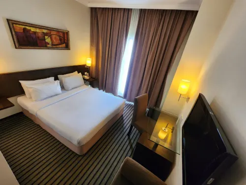 Harmoni One Convention Hotel and Service Apartments Kamar Photos