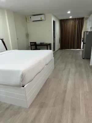 P.T. Grand Hotel Huoneet Photos