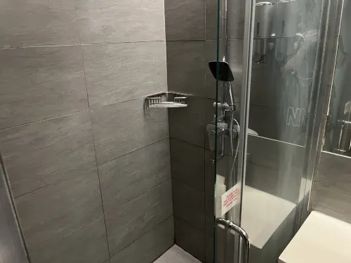 One Central Hotel & Suites Rooms Photos