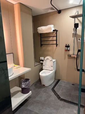 Qianji Hotel Rooms Photos