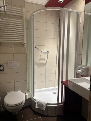 Promenade City Hotel Rooms Photos