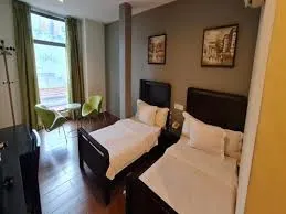 Kawana Tourist Inn Zimmer Photos