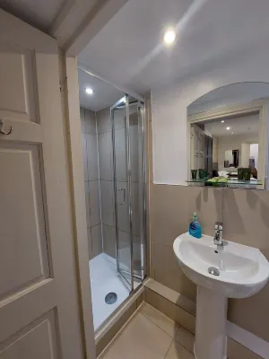 Palmerston Suites Chambres Photos