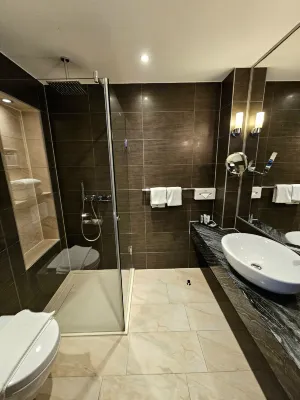XO Hotels Park West Zimmer Photos