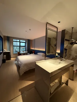 Langyi Hotel (Guangzhou Tower Pazhou Exhibition Center Branch) الغرف Photos