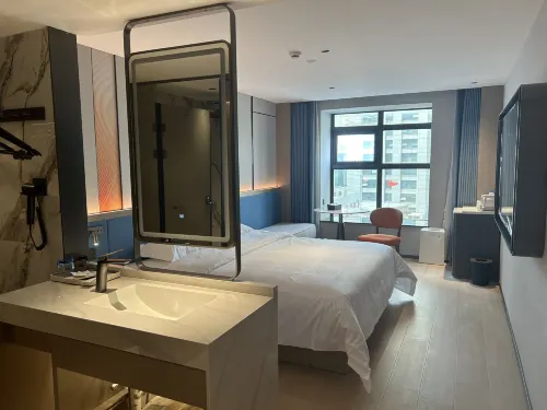 Langyi Hotel (Guangzhou Tower Pazhou Exhibition Center Branch) الغرف Photos