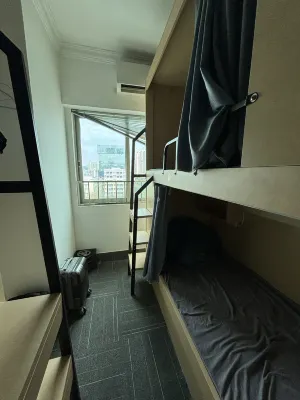 โฮสเทลสำหรับผู้เยาว์นวนจู่ (สถานีกีฬากว่างโจว ลินเหอซี) ห้องพัก  Photos