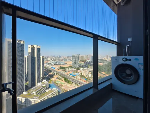 Yi Zhi. High Floor City View Huge-Screen Apartment(Shenzhen North Railway Station, Wanke Yue City) Photos