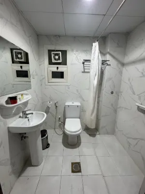 Al Jazeerah Hotel Chambres Photos
