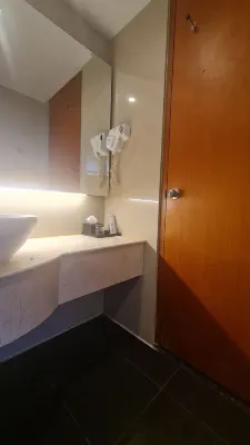 Quest Hotel Darmo Surabaya Kamar Photos