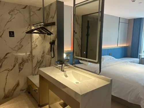 Langyi Hotel (Guangzhou Tower Pazhou Exhibition Center Branch) الغرف Photos