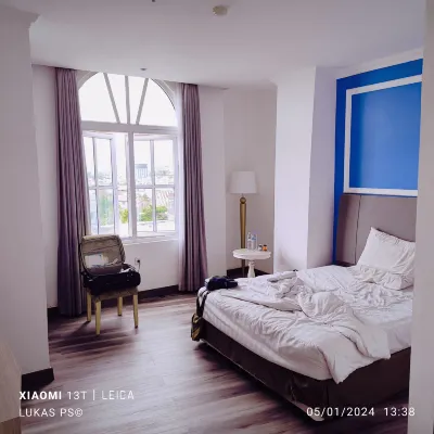 Luminor Hotel Palembang Kamar Photos