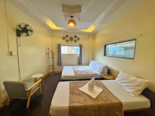 Cozy Coron Inn Chambres Photos