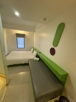 팝 호텔 말리오보로 요그야카르타 객실 Photos