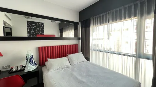 Essence Hotel Carlton Zimmer Photos