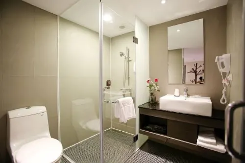 In One City Inn Chambres Photos