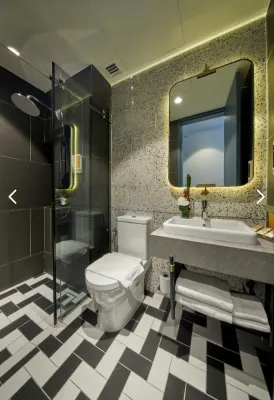 Sleeping Lion Suites Kamar Photos
