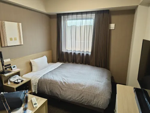 HOTEL ROUTE-INN UTSUNOMIYA YUINOMORI -LIGHTLINE YUINOMORI NISHI EKIMAE- Zimmer Photos